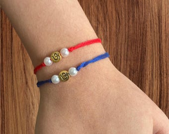 Handmade Aum Rakhi Bracelet: Raksha Bandhan Thread for Brother