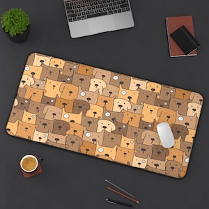 May include: A rectangular mouse pad featuring a repeating pattern of cartoon dogs in various shades of brown. The pad is on a dark surface, with a white mouse, laptop, and other office supplies visible.