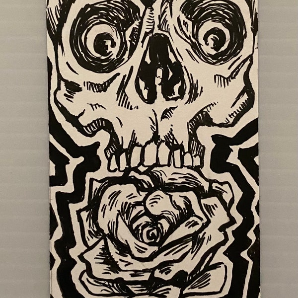 Wide Awake Skull and Rose piece of mini original art. This small piece of artwork shows a skull with wide eyes looking over a rose.