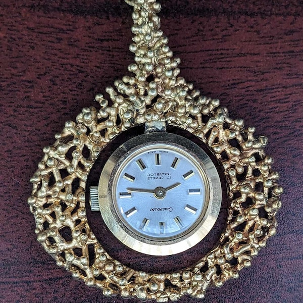 MONTRE OMEROUSO mécanique pour femme, montée en Pendentif, Vintage des années 60, Incabloc, Swiss Made, 17 Pierres. Fonctionne très bien.