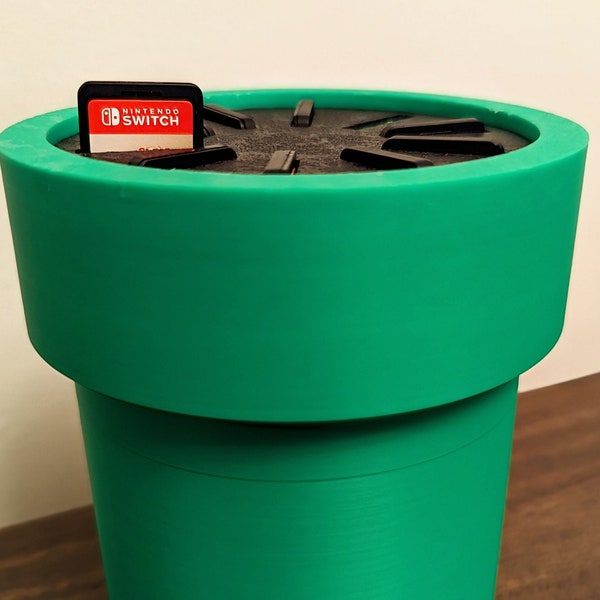 Warp pipe spinning Nintendo Switch video game storage - Super Mario game display