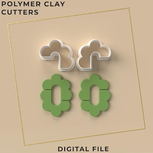 以下が含まれることがあります： デジタルファイル内のポリマークレイカッターの2つのセット。上部のセットは、雲に似たベージュの内側を持つ白いアウトラインです。下のセットは緑色で、中央の開口部がある花の形をしています。テキストは「POLYMER CLAY CUTTERS」と「DIGITAL FILE」と書かれています。