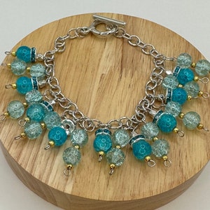 Multi Charm Bracelet, Handcrafted Chunky Beaded Charm bracelet with blue tassel beads