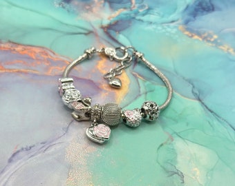 European style charm bead bracelet with a silver color chain and charms