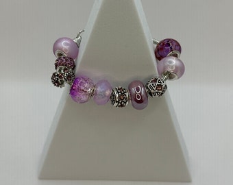 Pandora European style charm bracelet with lavender beads and silver charms