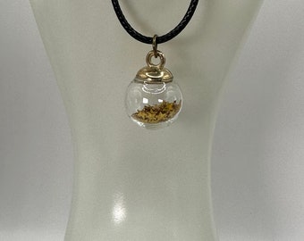 Glass ball with gold stars pendant with brown strap necklace
