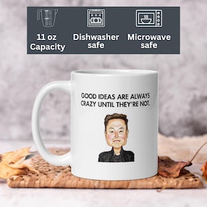 Könnte beinhalten: Weiße Keramik-Tasse mit Henkel, mit einer Karikatur eines Mannes und dem Zitat "GOOD IDEAS ARE ALWAYS CRAZY UNTIL THEY'RE NOT." Die Tasse hat ein Fassungsvermögen von ca. 325 ml und ist spülmaschinen- und mikrowellengeeignet.