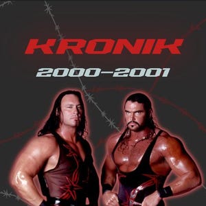 May include: Two wrestlers in black and red wrestling outfits with the text "KRONIK 2000-2001" above them. The wrestlers are standing in front of a black background with red barbed wire.