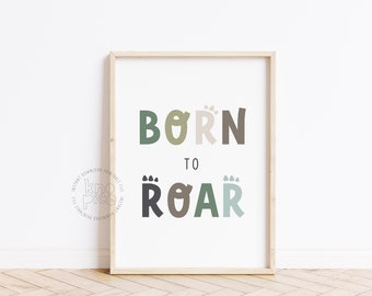 May include: A printable wall art print with the text "Born to Roar" in a playful font with green, brown, and beige colors. The text is centered on a white background.