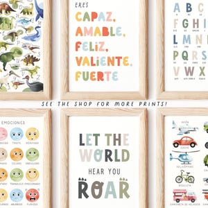 May include: A collection of framed art prints with a light wood finish. The prints feature colorful illustrations of dinosaurs, the Spanish alphabet, positive affirmations, emotions, vehicles, and the phrase "Let the World Hear You Roar."