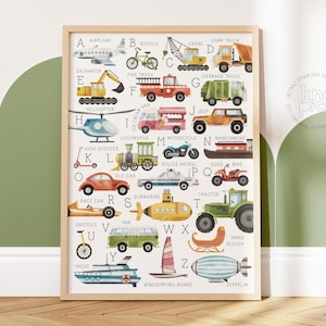 May include: A framed alphabet print featuring colorful illustrations of vehicles, from airplanes to zeppelins. Each letter of the alphabet is paired with a different vehicle, including a bicycle, fire truck, and submarine. The print is in a wooden frame.