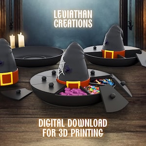 May include: A Halloween serving tray set with a witch hat design. The black trays have red and yellow accents, with a spider web and spider graphic. The text "LEVIATHAN CREATIONS" and "DIGITAL DOWNLOAD FOR 3D PRINTING" are visible.