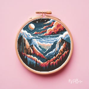 May include: A cross-stitch pattern of a mountain range with a crescent moon and clouds in the sky. The mountains are a mix of blue, green, and brown, with a red and orange sunset in the background.
