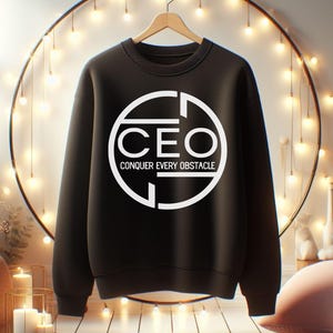 May include: Black sweatshirt with a white circle graphic that says "CEO Conquer Every Obstacle".