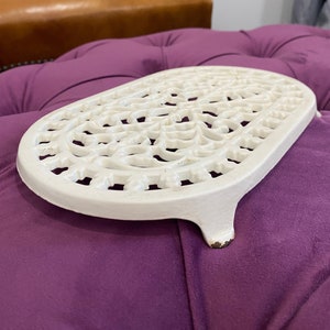 Enamel coated cast iron trivet