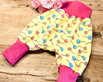 Pantalón de bebé de crecimiento confeccionado en algodón orgánico con motivo de piruleta, niño, niña, género neutro. Pantalones de bebé más vendidos