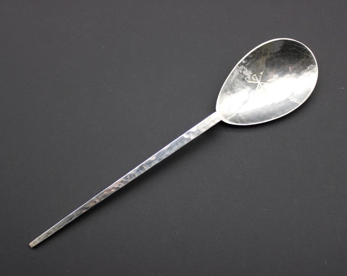 An Albert Edward Jones, Birmingham 1971, Planished Silver Reproduction Roman Spoon