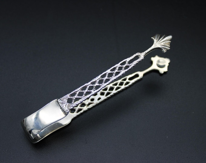 A Pair of Thomas Bradbury & Sons, Sheffield, Victorian Period Cast Sugar Tongs