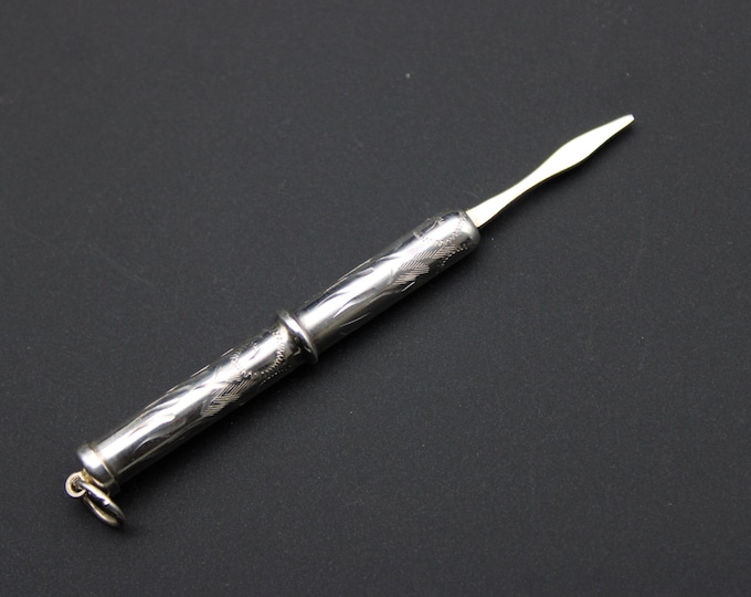 A Douglas Pell, Hertfordshire, Silver Retractible Screw Toothpick