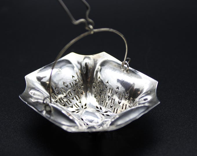 A 19th Century Sterling Silver 'Hanging Basket-Type' Tea Strainer