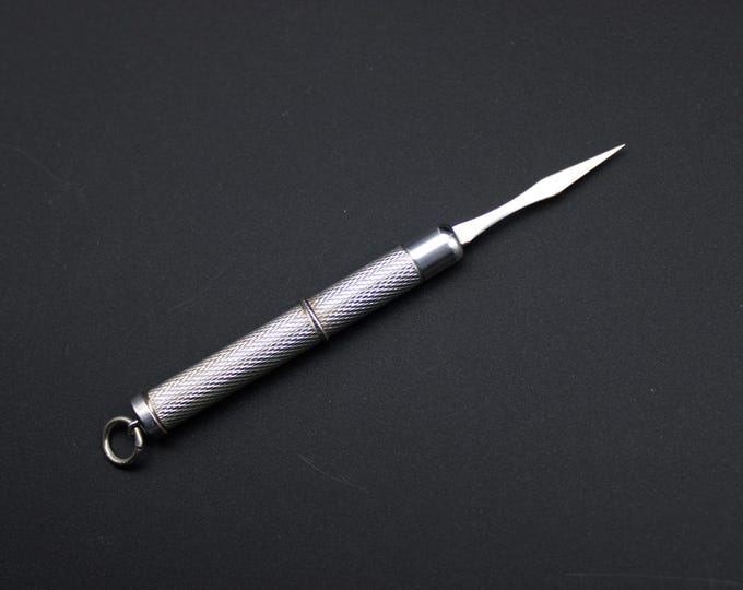 A ?William Manton, Birmingham, Silver Retractible Screw Toothpick