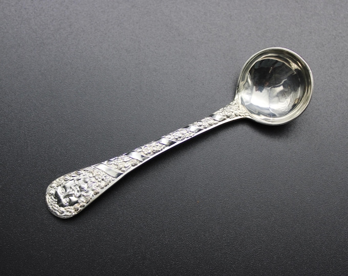 An Alan Kelsey, London, 'Green Man' Pattern Large Salt Spoon