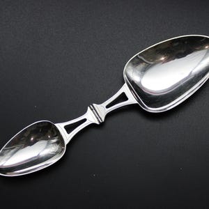 An Early 20th Century American Sterling Silver Folding Medicine Spoon