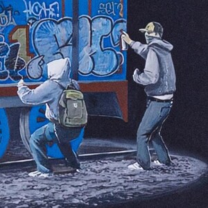 May include: A painting depicting two figures in hoodies and jeans applying graffiti to the side of a blue train car. One figure crouches while wearing a backpack, and the other stands while using a spray paint can. The train features blue wheels and large, stylized blue and black lettering against a dark background.