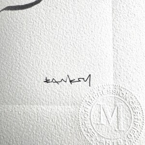 May include: A white textured paper print featuring a black ink signature that reads Banksy. In the lower right corner, there is a circular embossed stamp with the letter M in the center and the text Impression Certifiee surrounding it.