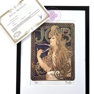 May include: A framed art print of the Alphonse Mucha JOB poster featuring a woman with flowing hair, set against a dark purple background with the text JOB. Includes a white mat, black frame, and a certificate of authenticity with gold borders.
