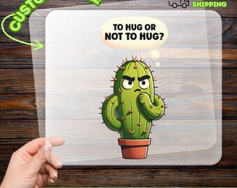 May include: A DTF transfer featuring a cartoon cactus in a terracotta pot, pondering the question, "TO HUG OR NOT TO HUG?" The design is green with brown spines and a thought bubble. The transfer is customizable and ready to apply.