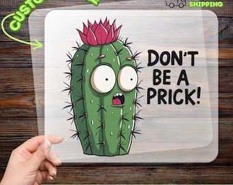 May include: A DTF transfer featuring a cartoon cactus with a surprised expression and the text "DON'T BE A PRICK!". The cactus is green with a pink flower and black spines. The transfer is customizable and ready to apply.