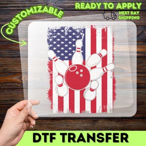 May include: DTF transfer featuring a distressed American flag design with a red bowling ball and white bowling pins. The design is customizable and ready to apply. The image also includes the text "DTF TRANSFER".