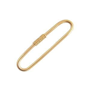 May include: A gold-toned metal safety pin with an elongated oval shape. The pin features a smooth, rounded wire frame and a central coiled spring mechanism that secures the closure, providing a functional and simple design for various uses.