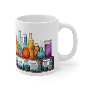 May include: White ceramic mug with a colorful illustration of a shelf filled with glass bottles and beakers containing different colored liquids. The bottles and beakers are arranged in a row on a wooden shelf.
