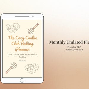 May include: A digital tablet shows a baking planner titled "The Cozy Cookie Club Baking Planner." The planner features illustrations of cookies and a whisk, with the text "Plan, Track & Bake Your Favorite Cookies." The background is a beige to brown gradient.