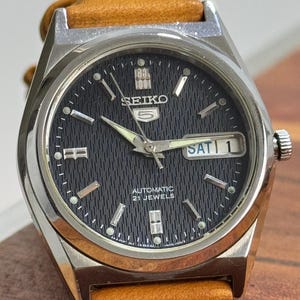 Vintage Seiko 5 black dial, orange leather strap - automatic gents rare dial clean watch (H7)