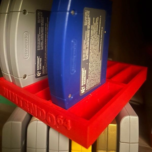 N64 stackable game holder/organizer. Nintendo 64 (stackable game cartridge organizer and storage tray for Nintendo 64 games) Holds 12 games.