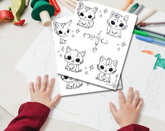 May include: Two white sheets of paper with black line drawings of cartoon cats, stars, and the word "meow". The sheets are on a white surface with colored pencils, pens, and other toys scattered around.