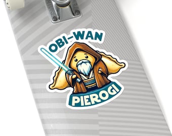 May include: A sticker of a cartoon pierogi dressed as Obi-Wan Kenobi, holding a lightsaber. The sticker says "Obi-Wan Pierogi" in blue and white text.