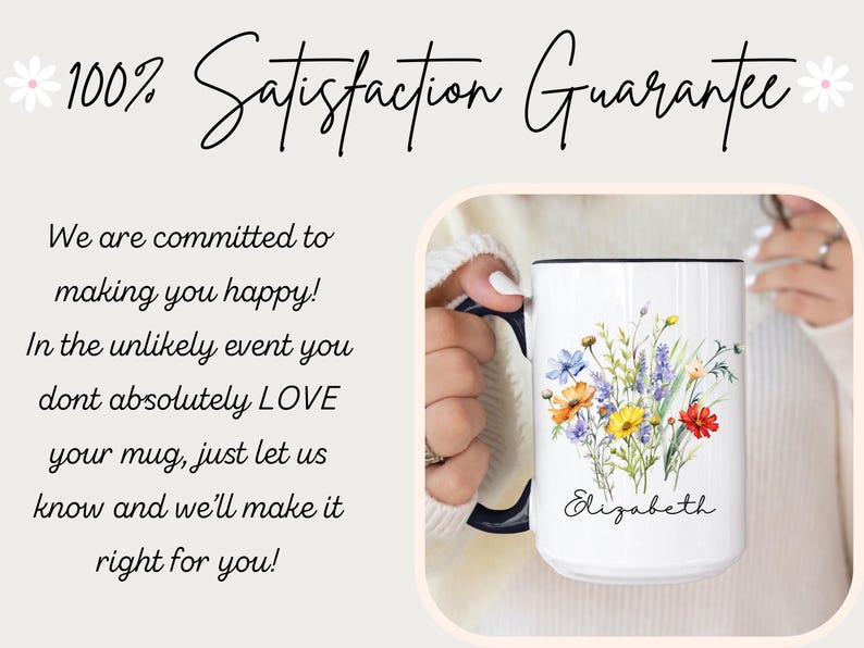 May include: A white ceramic mug with a dark blue handle and rim, featuring a colourful watercolour-style floral bouquet illustration and the name Elizabeth printed in black script. The text 100% Satisfaction Guarantee is visible above.