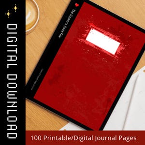 May include: A digital journal file displayed on a tablet screen with a deep red cover featuring a white rectangular label, a small red heart icon, and the text The Gamer's Save File and Open-Concept Page Journal, with 100 printable pages.