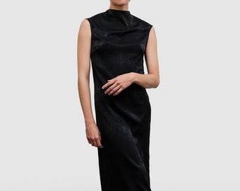 The Luna mock neck dress in brushed sueded Faille Fabric, long sleeveless dress, color black.