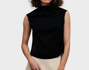 The Luna mock neck top, brushed sueded top, sleeveless top in color Black