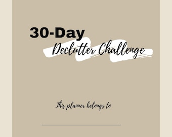 May include: A beige planner with the text "30-Day Declutter Challenge" in black and white. Below, it reads "This planner belongs to" with lines for writing. The bottom features a logo and a website address.