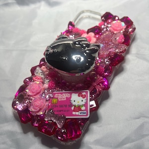 May include: A set of three ceramic mugs with a speckled, matte finish. Each mug features a different color: light blue, cream, and gray. The mugs have a simple, modern design and a comfortable handle.