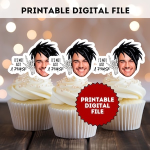 May include: Three cupcakes with white frosting and pearl sprinkles, each topped with a decorative image of a person with black hair and the text "IT'S NOT JUST A PHASE". The image also includes the text "PRINTABLE DIGITAL FILE".
