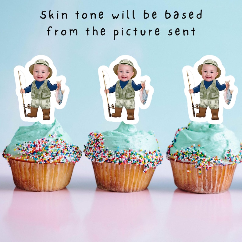 May include: Three cupcakes with blue frosting and colorful sprinkles topped with edible images of a boy dressed as a fisherman holding a fishing rod and a fish.