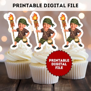 May include: Three cupcakes topped with white frosting and edible pearls. Each cupcake has a decorative cutout of a boy holding a torch. The cutouts are printed with the text "PRINTABLE DIGITAL FILE".