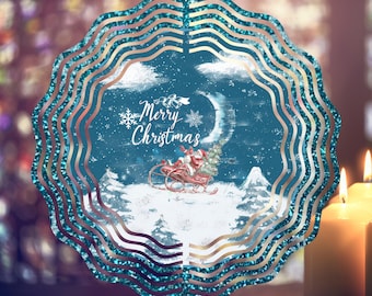 May include: A teal blue metal wind spinner with a winter scene featuring Santa Claus in a sleigh with the text "Merry Christmas".